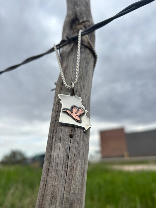 The Migration Pendant