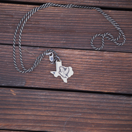 "The White-Wing Pendant"